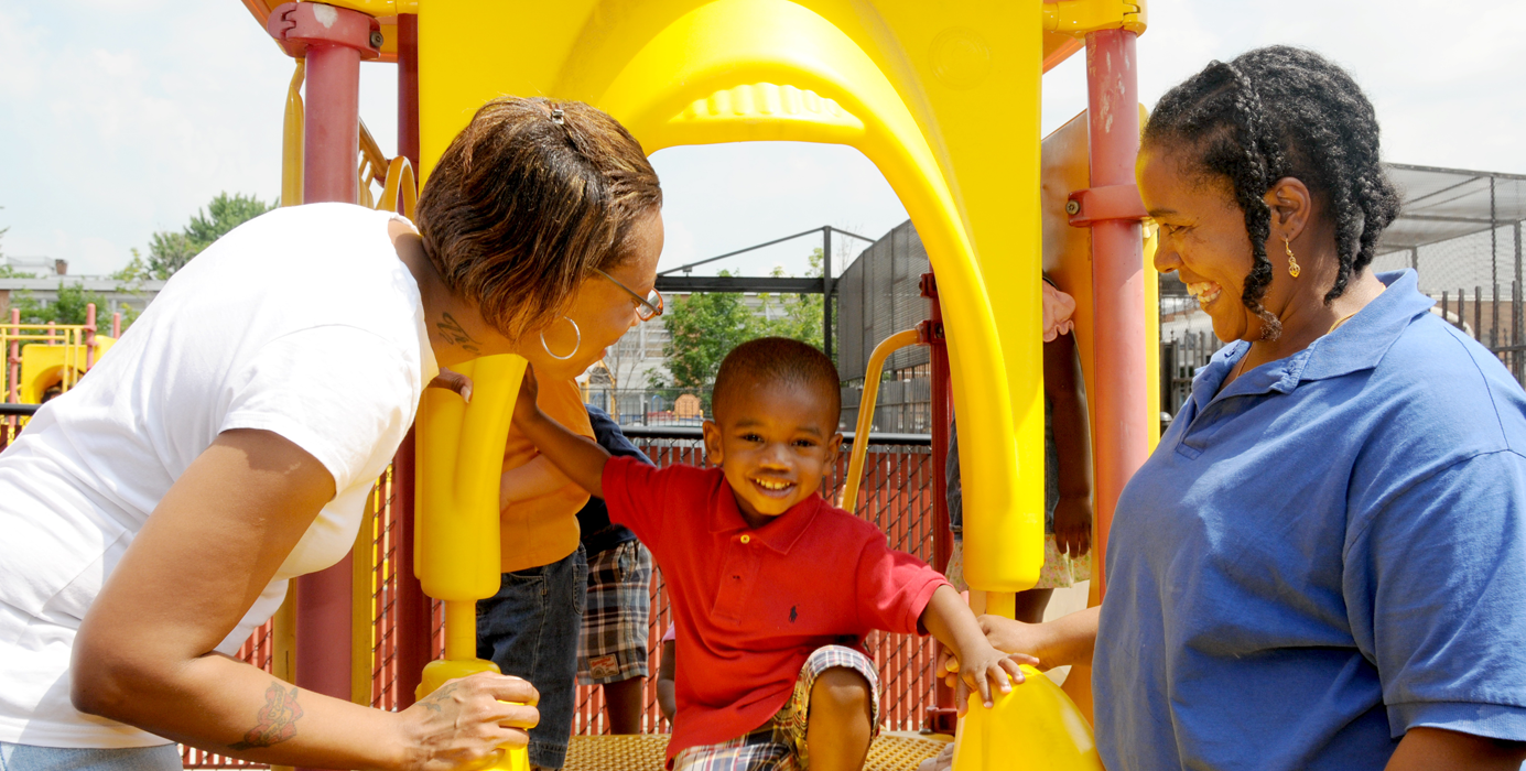 Child playing on slide