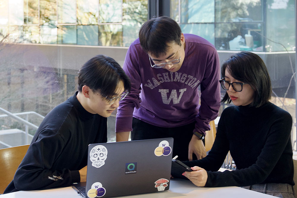 Students working at laptops