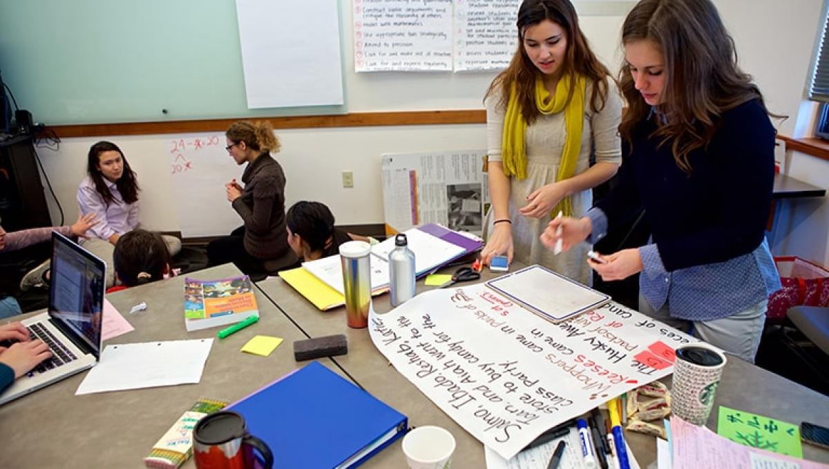 Two students working in a classroom