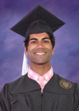Zain Suleman in cap and gown
